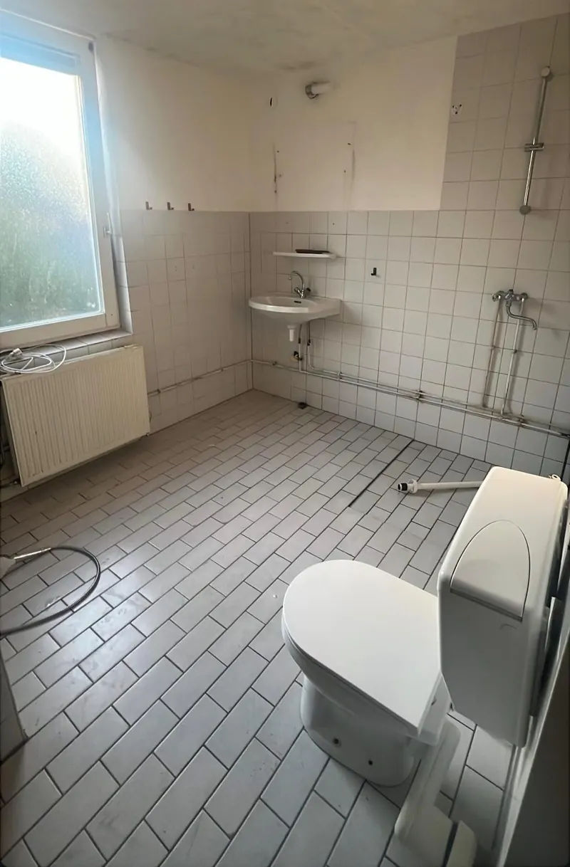 De badkamer vóór de renovatie
